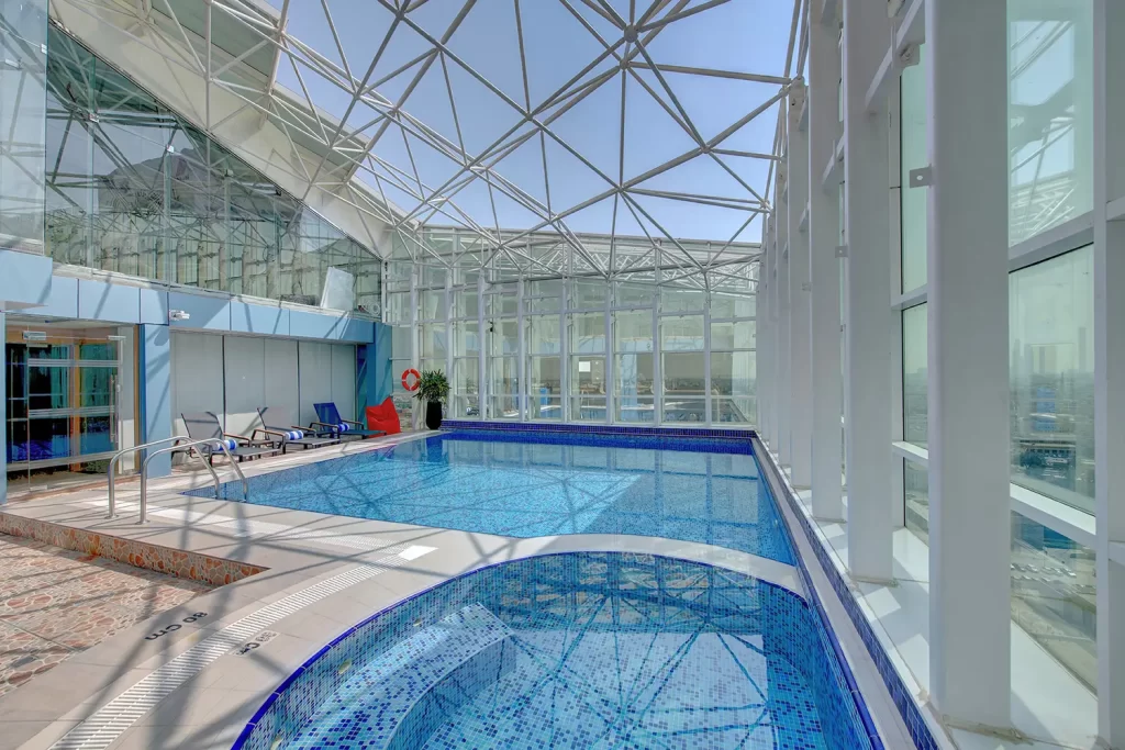 Hotel pool in Abu Dhabi city centre at La Quinta by Wyndham Abu Dhabi Al Wahda